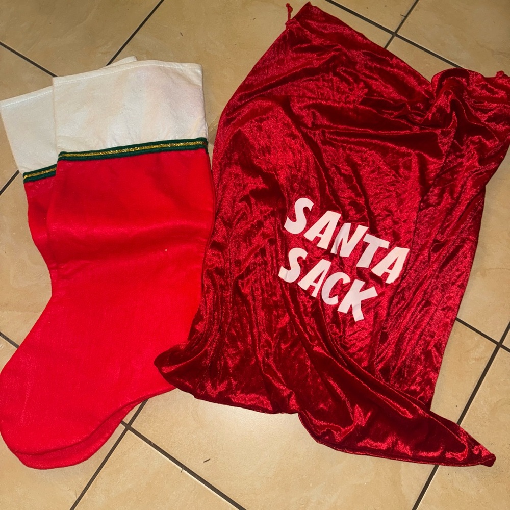 2 large Christmas stockings and a large Santa sack
